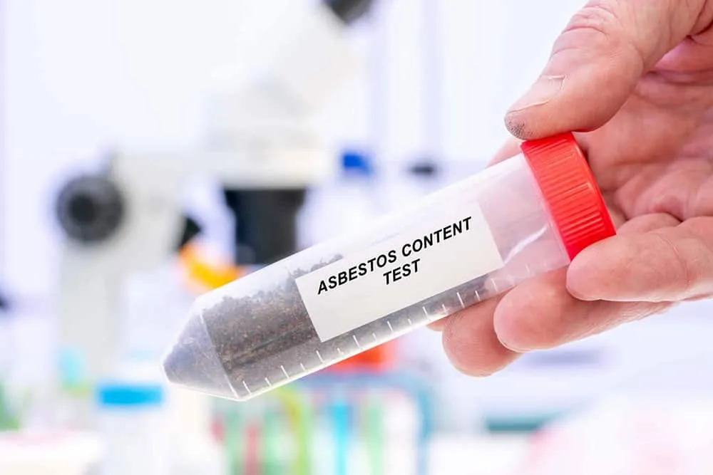 Material in a test tube going for asbestos testing