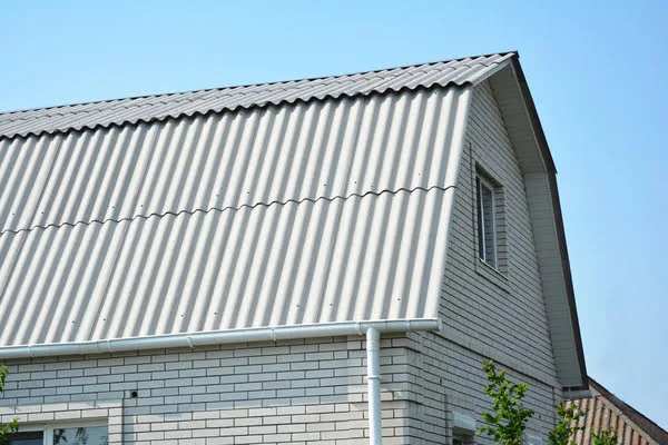 House with asbestos roofing, highlighting asbestos concerns for home buyers and sellers.
